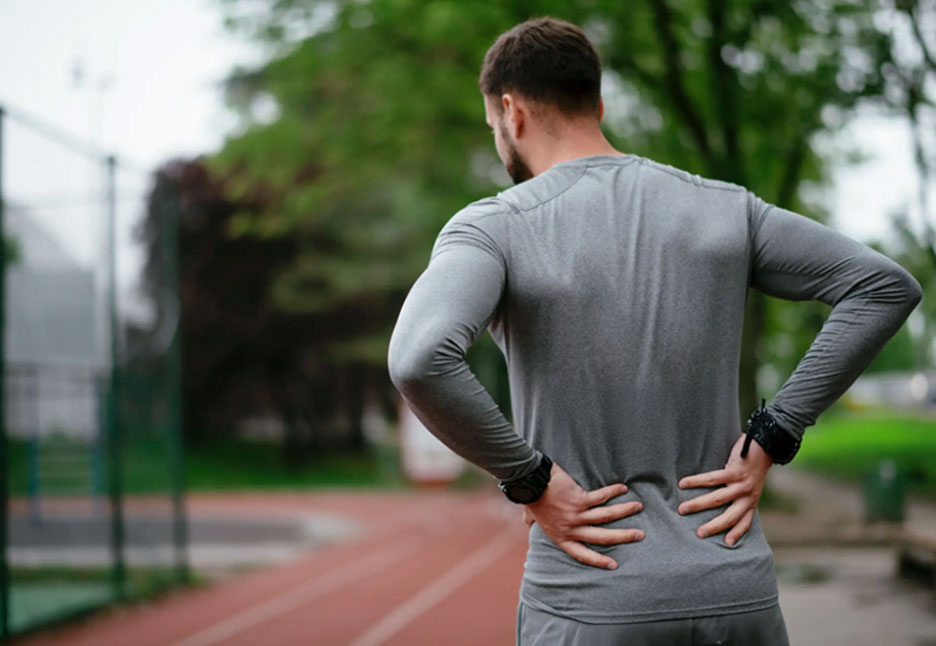 a person Feel Lower Back Pain When Walking